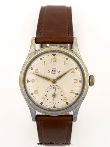 DELUXE SMITHS A 409 PATTERN DENNISON CASED EXPEDITION WRISTWATCH 1954/55 WITH BOX AND PAPERS