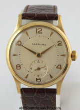 GARRARD SMITHS RETAILED FOR FORD PRESENTATION WATCH WITH SMITHS 18 JEWEL HIGHEST GRADE MANUAL MOVEMENT IN THE ORIGINAL FORD BOX WITH PAPERS