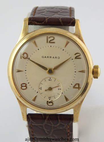 GARRARD SMITHS RETAILED FOR FORD PRESENTATION WATCH WITH SMITHS 18 JEWEL HIGHEST GRADE MANUAL MOVEMENT IN THE ORIGINAL FORD BOX WITH PAPERS