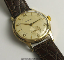 GARRARD SMITHS RETAILED FOR FORD PRESENTATION WATCH WITH SMITHS 18 JEWEL HIGHEST GRADE MANUAL MOVEMENT IN THE ORIGINAL FORD BOX WITH PAPERS