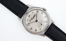 SMITHS THOMAS RUSSELL & SON STEEL DENNISON CASED 15J ENGLISH WRISTWATCH
